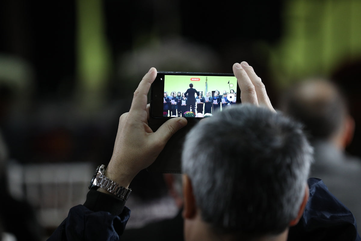 a man holding a cell phone